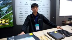 NovaStar’s Jacob Tian with some of its COEX-compatible processors